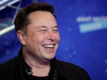Dogefather Elon Musk Laughs at Media Report Comparing Time, Dogecoin