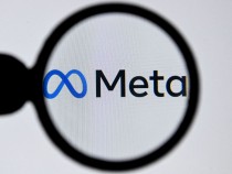 Meta Logo under magnifying glass