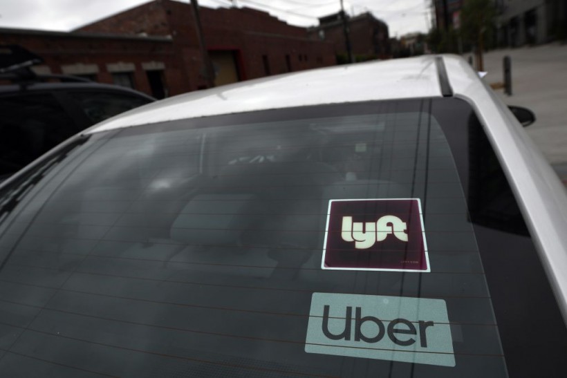 Lyft, Uber Cut Back on New Hiring, But Promise No Layoffs 