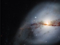 Hubble Space Telescope Snaps Photo of Galaxy Whose Formation is Disrupted