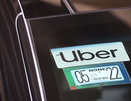 Uber logo in car