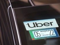 Uber logo in car