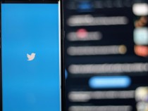 Twitter logo with monitor background