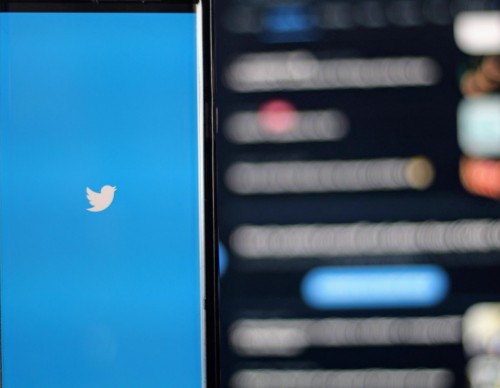 Twitter logo with monitor background