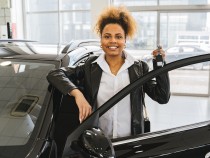 Woman in Black Blazer Holding Car Keys Smiling