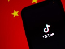 TikTok on Phone with China flag in background