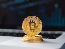 Selective Focus of Bitcoins on Laptop Computer