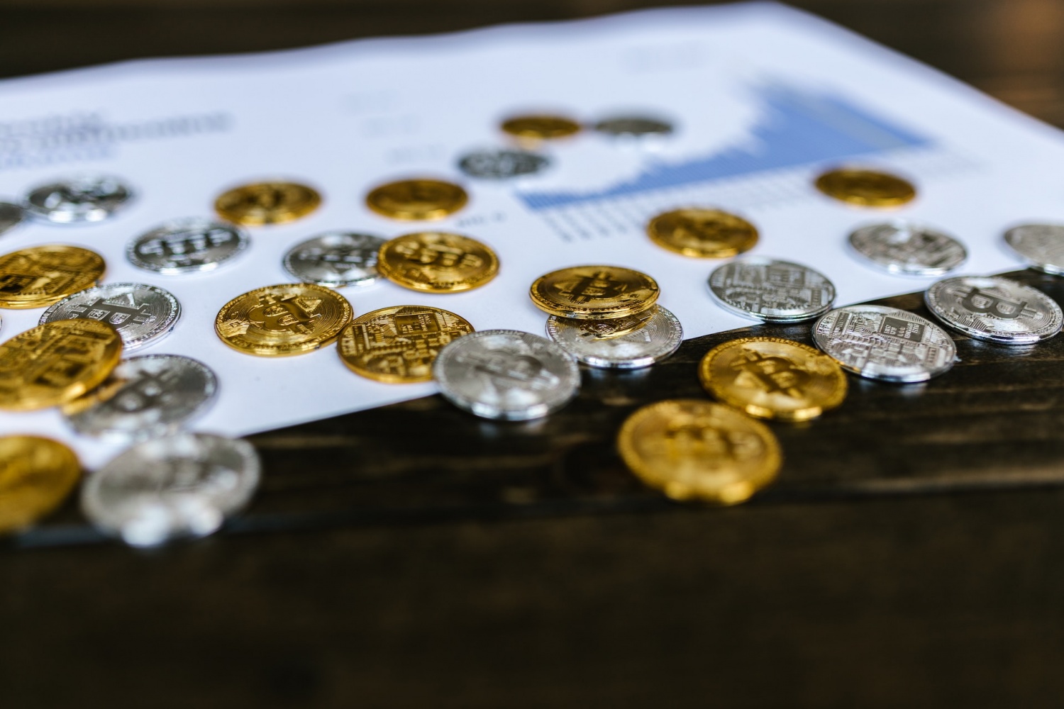 Close-up Photo of Silver and Gold Coins