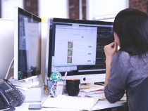 Woman Using Imac