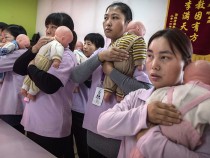 Learning Childcare At Beijing's Nanny University