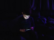 Child Using Phone