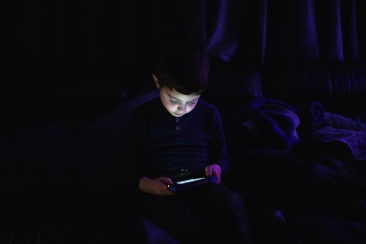 Child Using Phone