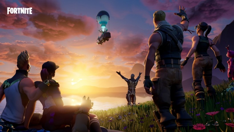 Fortnite characters waving goodbye to the Battle Bus