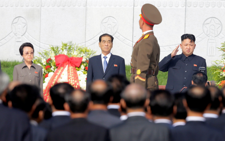 FILE PHOTO: North Korean leader Kim Jong Un salutes as an honour guard march past as he and his aunt Kim Kyong Hui, Premier Pak Pong Ju attend the opening ceremony of the Cemetery of Fallen Fighters of the Korean People's Army (KPA) in Pyongyang