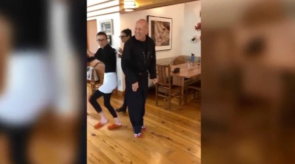 Bruce Willis takes the challenge of the Moonwalk