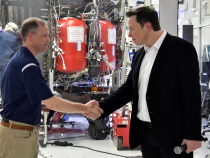 FILE PHOTO: NASA Administrator Jim Bridenstine and SpaceX Chief Engineer Elon Musk shake hands after a tour of SpaceX headquarters in Hawthorne