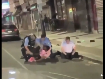 [Viral Video] Cop Makes Pinned Man Hold a Stick Just So That He Can Have a Reason to Beat Him