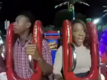 Couple on reverse bungee ride