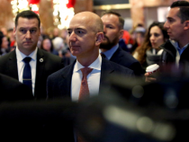 FILE PHOTO: Jeff Bezos, founder, chairman, and chief executive officer of Amazon.com enters Trump Tower ahead of a meeting of technology leaders with President-elect Donald Trump in Manhattan, New York City, U.S.