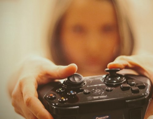 Woman with a video game controller